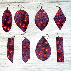 Purple with orange jack o lantern faux leather earrings